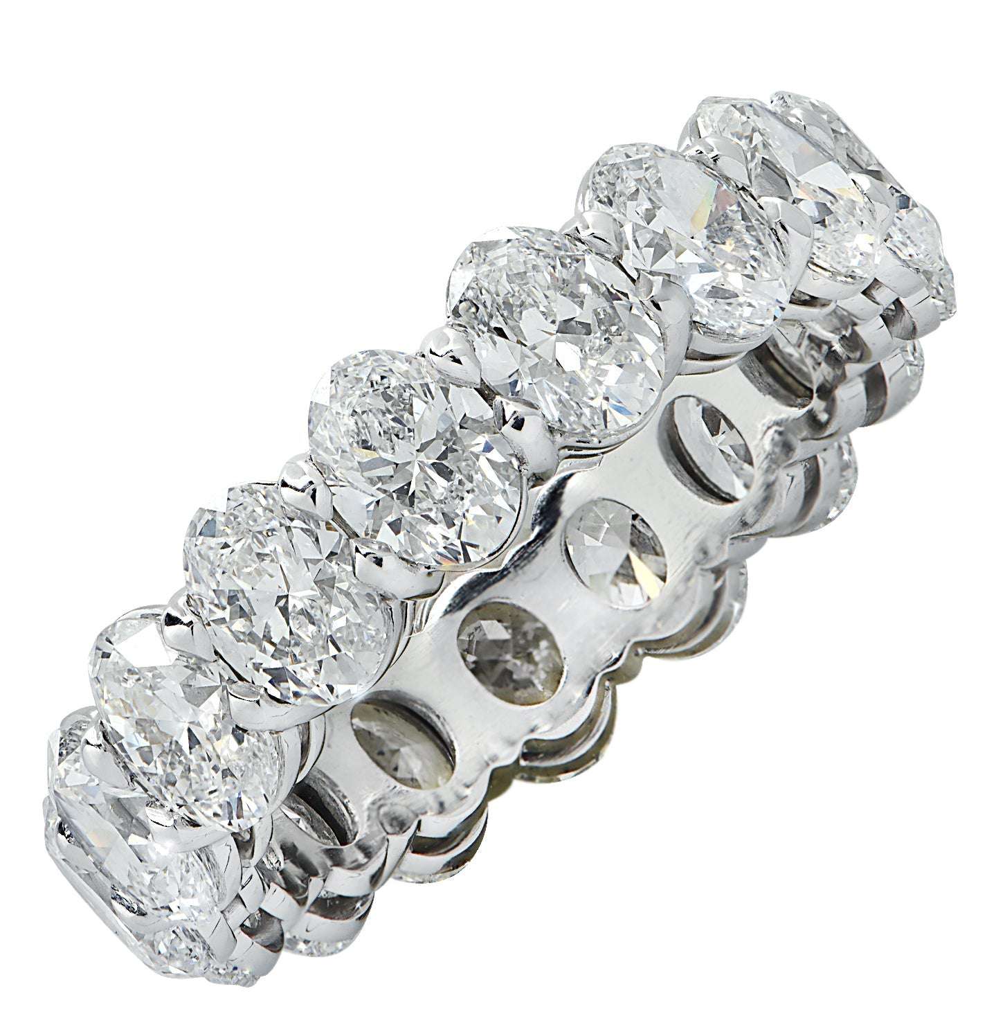 Luxurious Vivid Diamonds 4.39 Ct Platinum Diamond Eternity Band showcasing 18 oval cut diamonds, elegantly designed with unmatched brilliance.