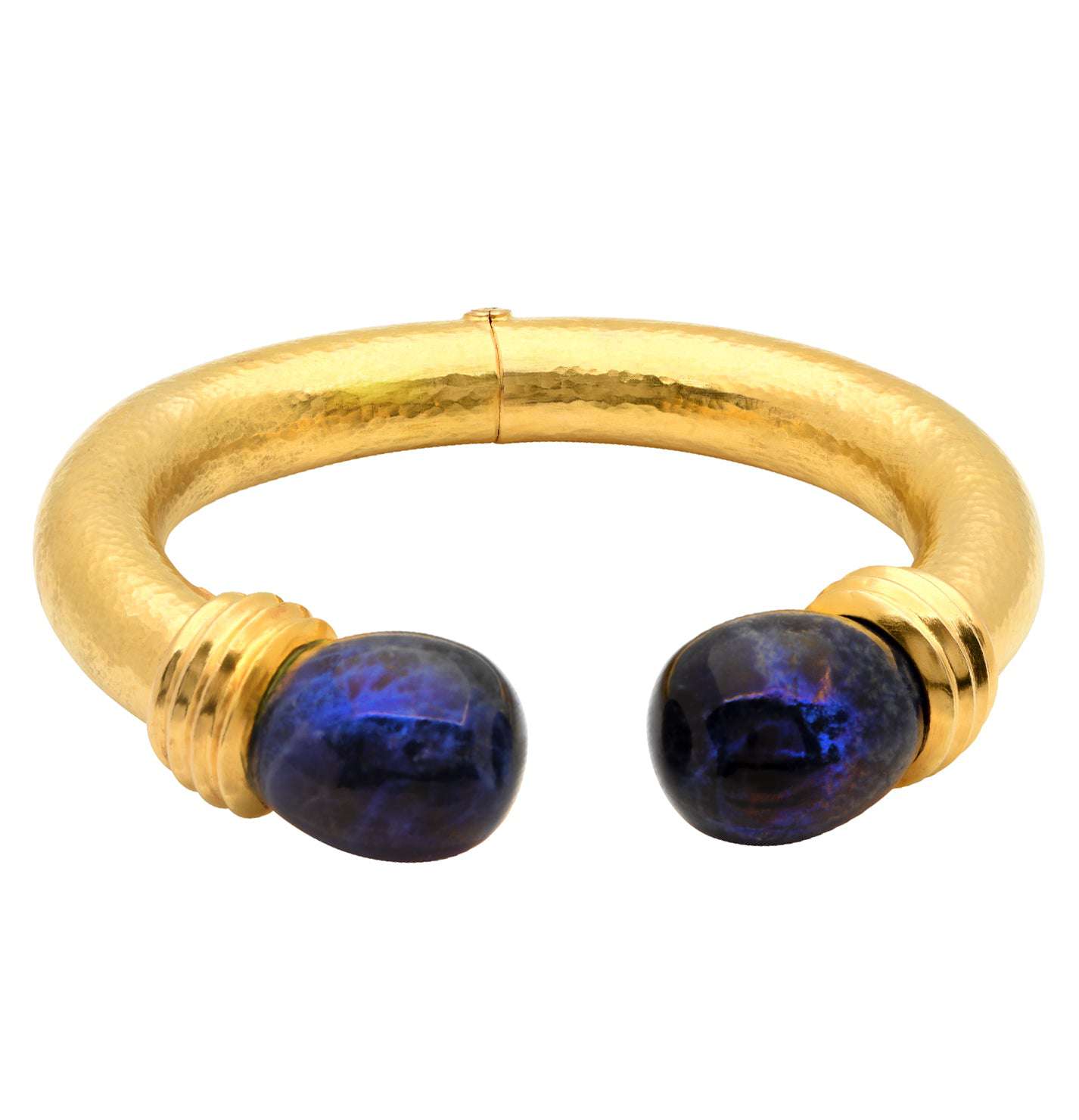 Side view of the exquisite 18k Yellow Gold Lalounis Sodalite Cuff Bangle by Vivid Diamonds, emphasizing its bold structure and rich blue sodalite ends.