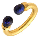 Stunning 18k Yellow Gold Lalounis Sodalite Cuff Bangle by Vivid Diamonds featuring deep blue sodalite cabochons and a hammered texture.