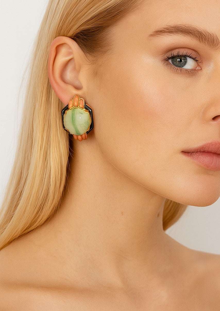 Elegant model showcasing stunning 18K yellow gold coral, jade & onyx earrings by Vivid Diamonds, highlighting vintage-inspired design with intricate details.