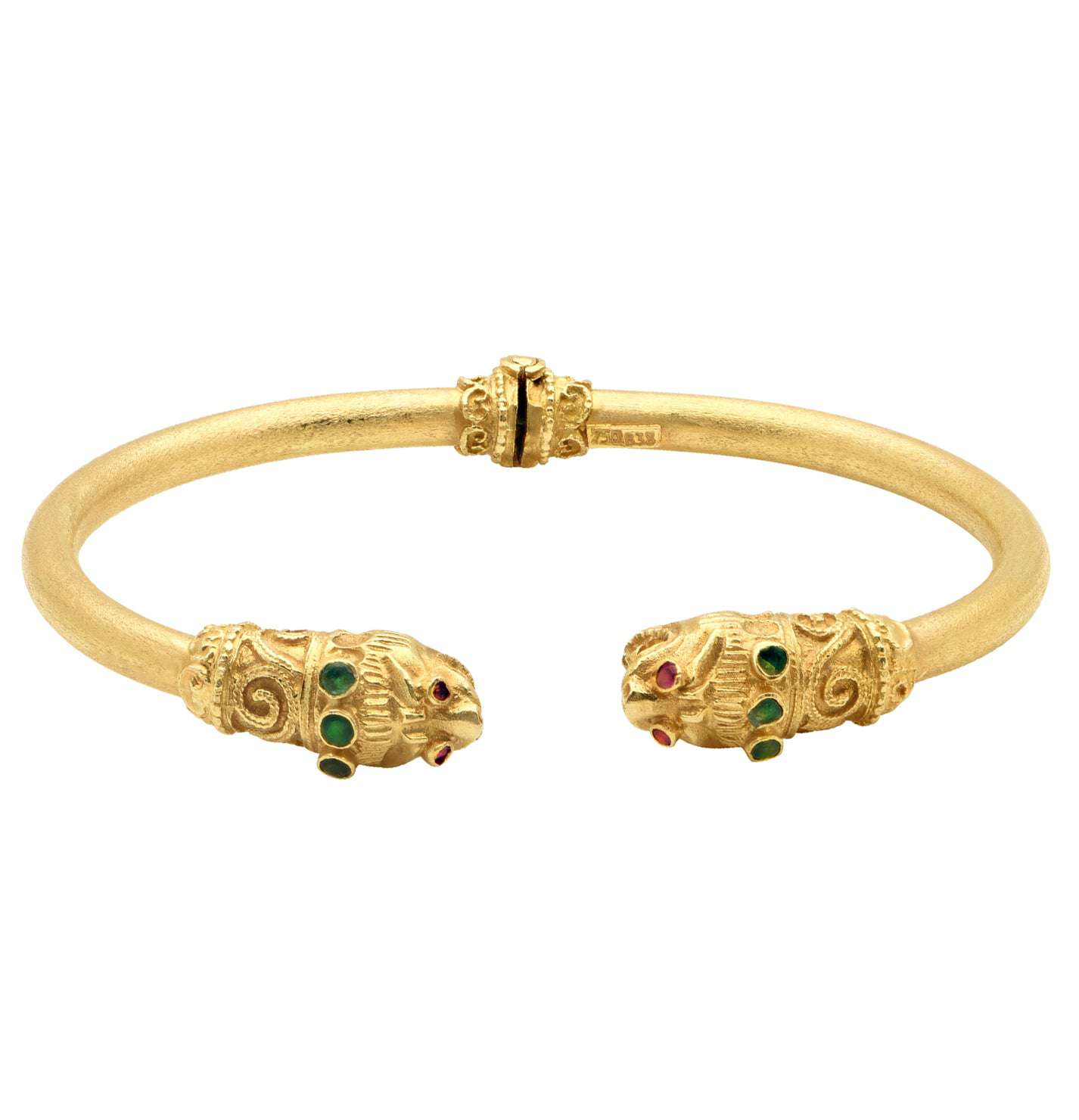 Close-up view of the 18K Yellow Gold Double Lion Cuff Bracelet with Ruby Eyes & Emerald Accents by Vivid Diamonds, highlighting the intricate details and colorful gemstones.