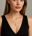 Exquisite 2.25ct Rose Cut Diamond Pendant in Platinum by Vivid Diamonds being worn, highlighting its modern elegance and timeless charm on a sophisticated neckline.