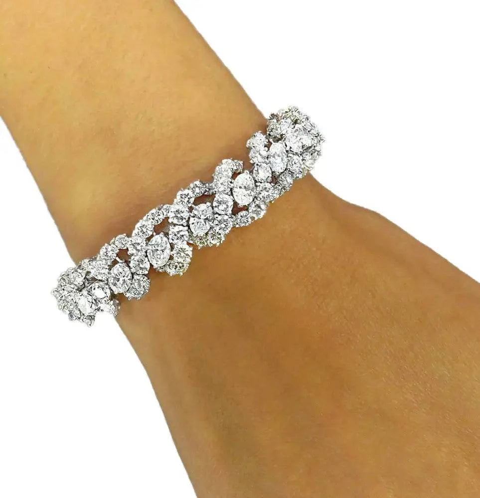 Oscar Heyman 29.41 Diamond Bangle Bracelet Circa 1963 -V37155 - Vivid Diamonds